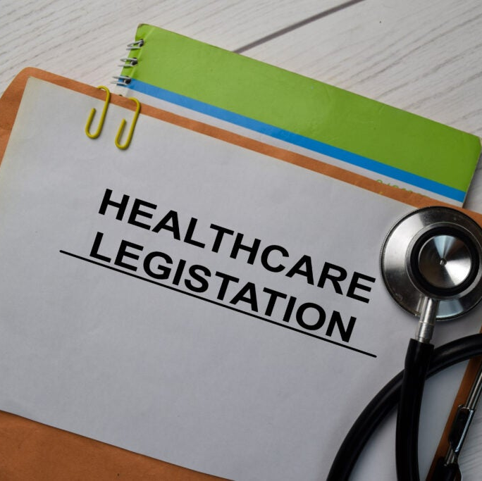 stethoscope and folder that says healthcare legislation